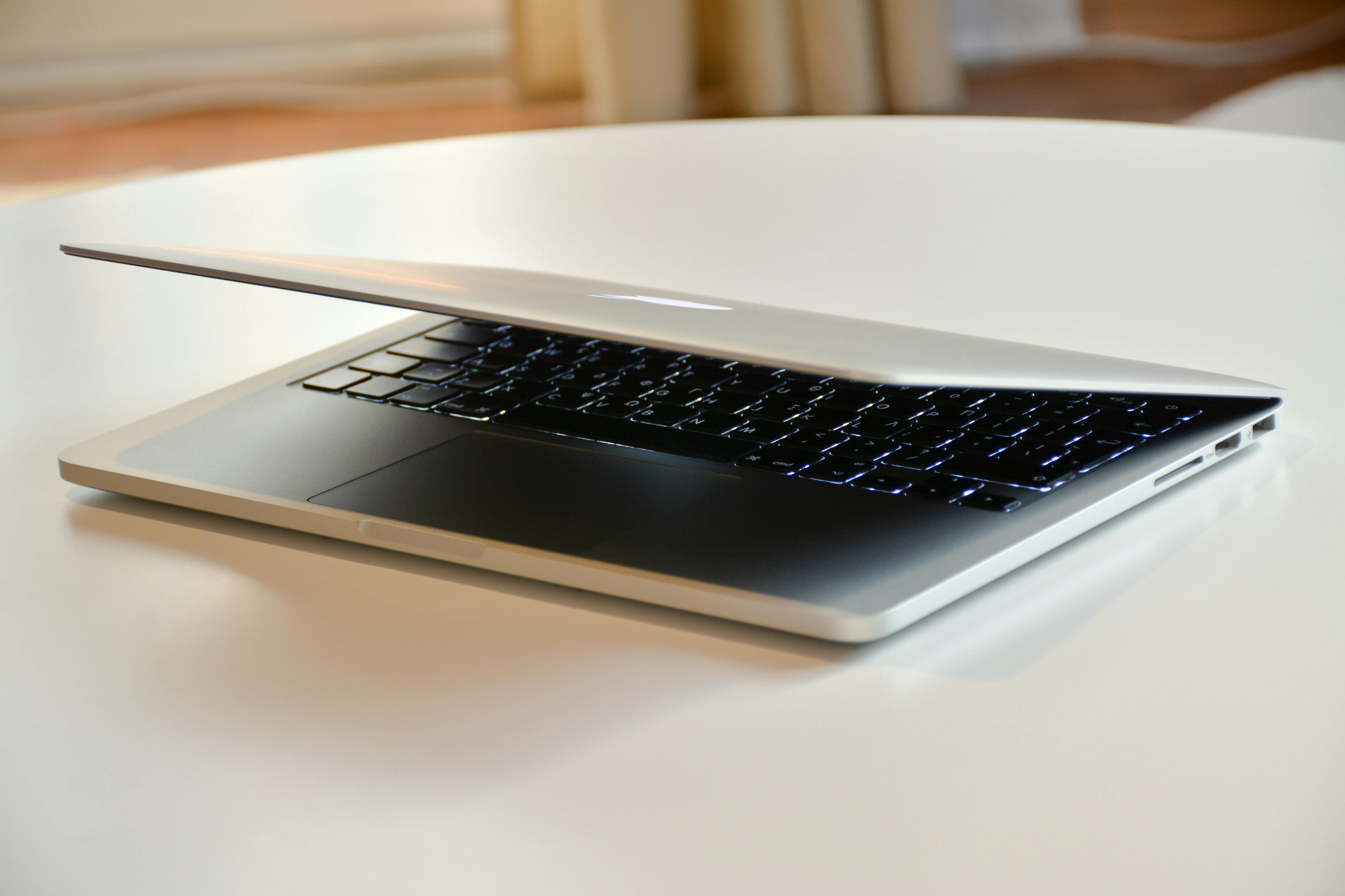 Workspace with laptop, notebook and office tools