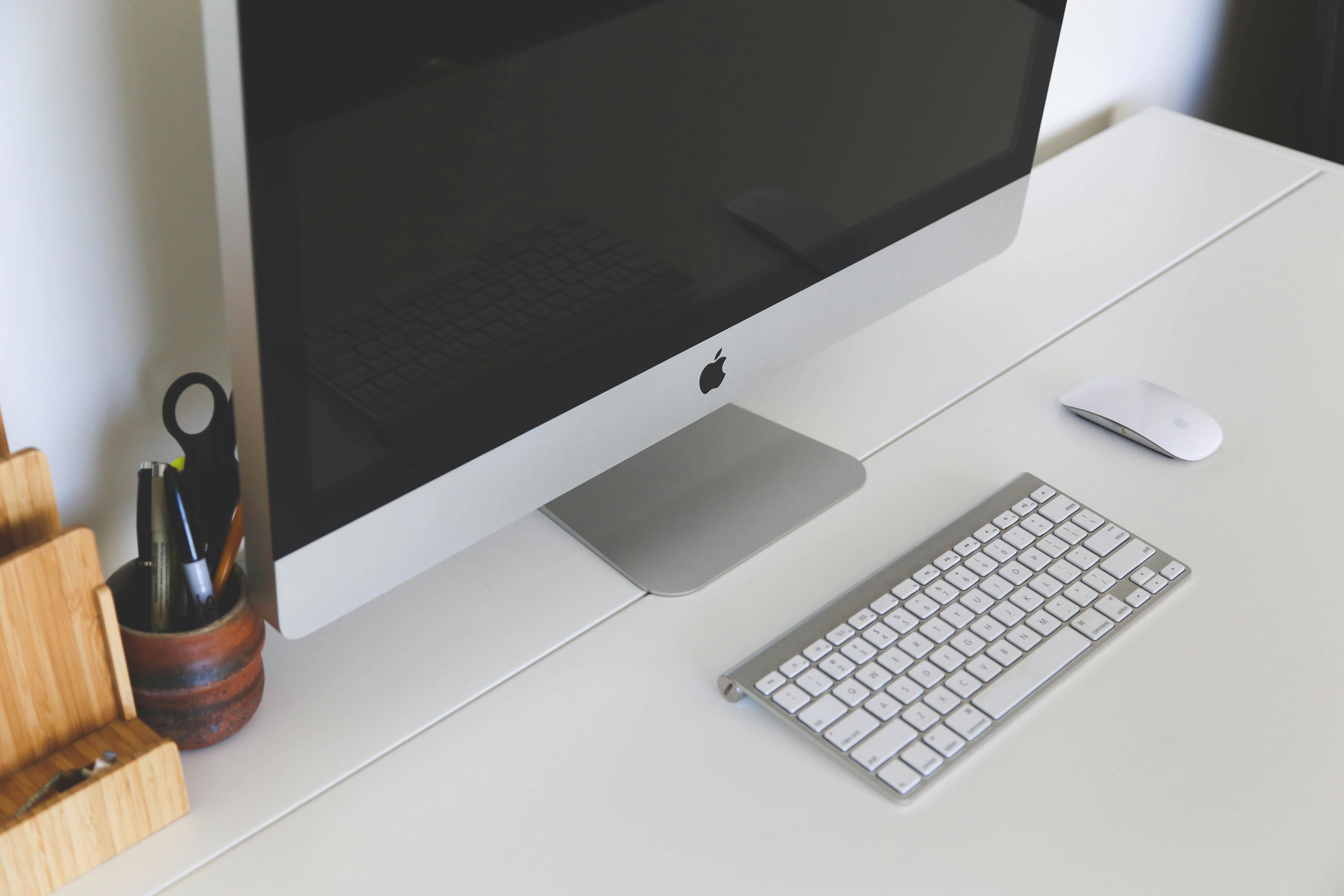 Workspace with laptop, notebook and office tools