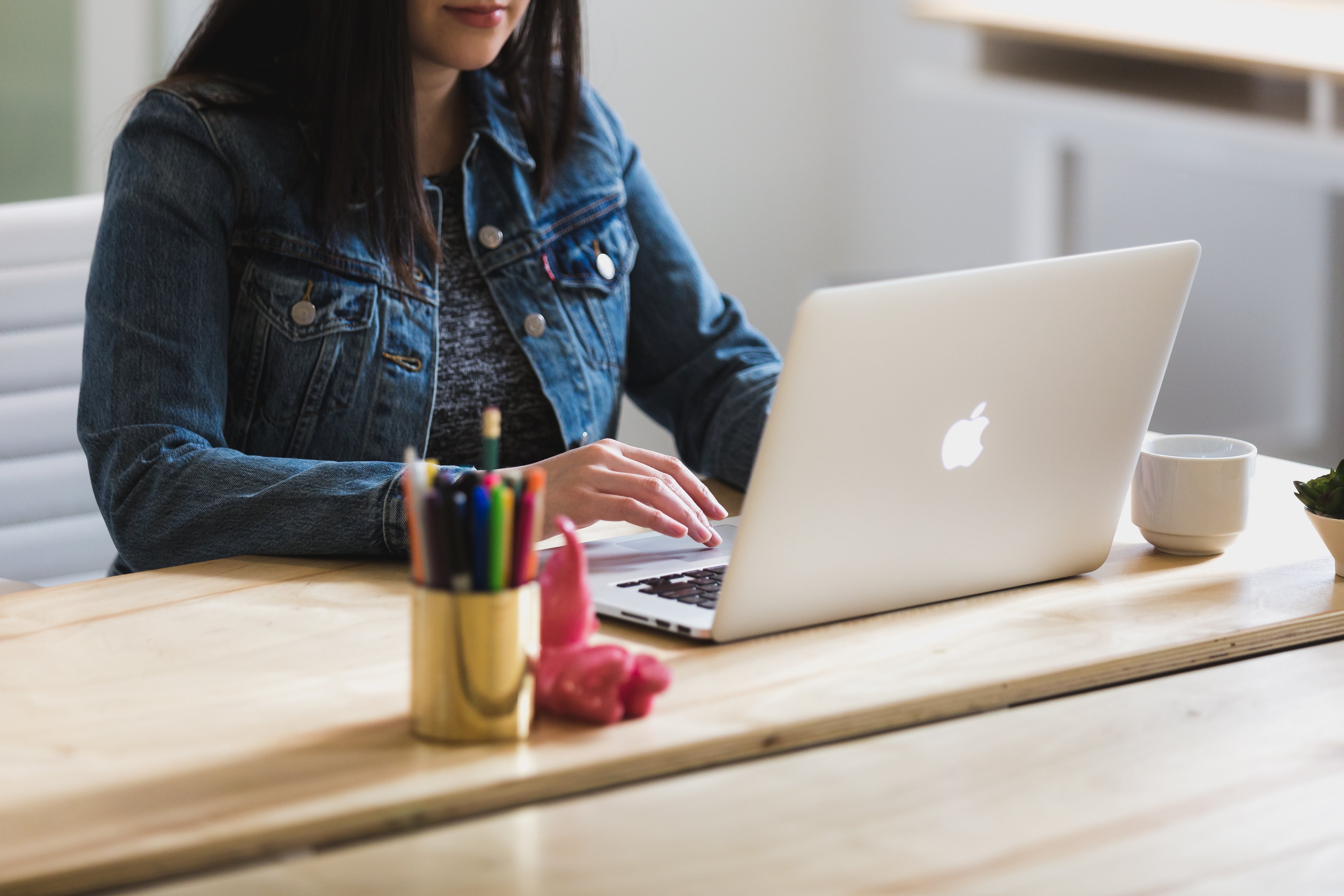 Woman works at desk